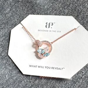 Elegant Gold Necklace with Blue and Clear Accents